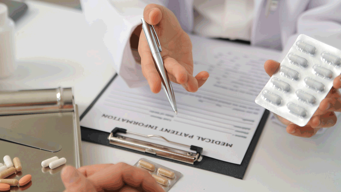 a doctor talking to a patient about their prescription