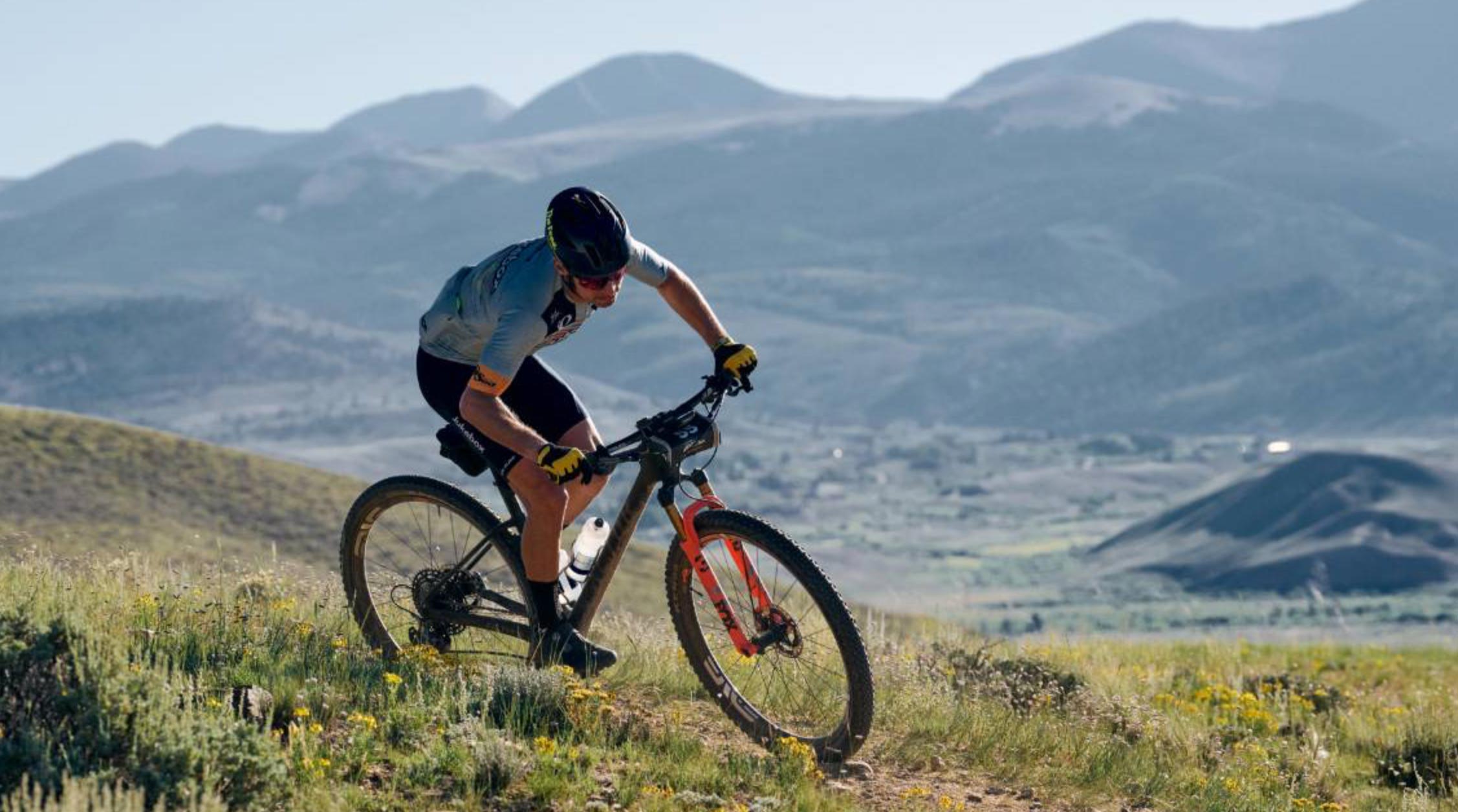 Alexey Vermeulen on his bike in the mountains