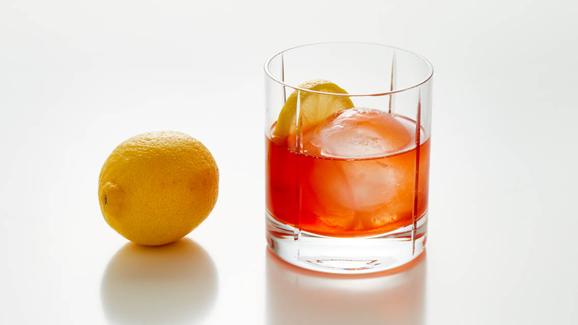 a glass of green tea manhattan