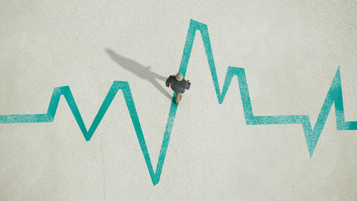 illustration of person walking on a EKG line