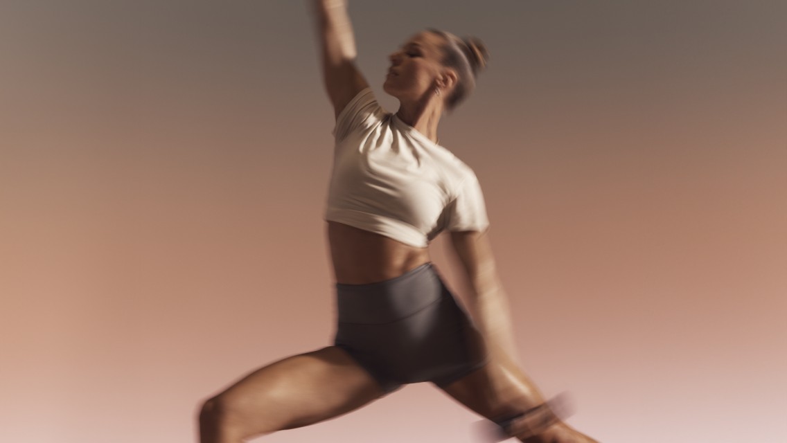 Person holding a yoga pose in a Warrior Sculpt class at Life Time
