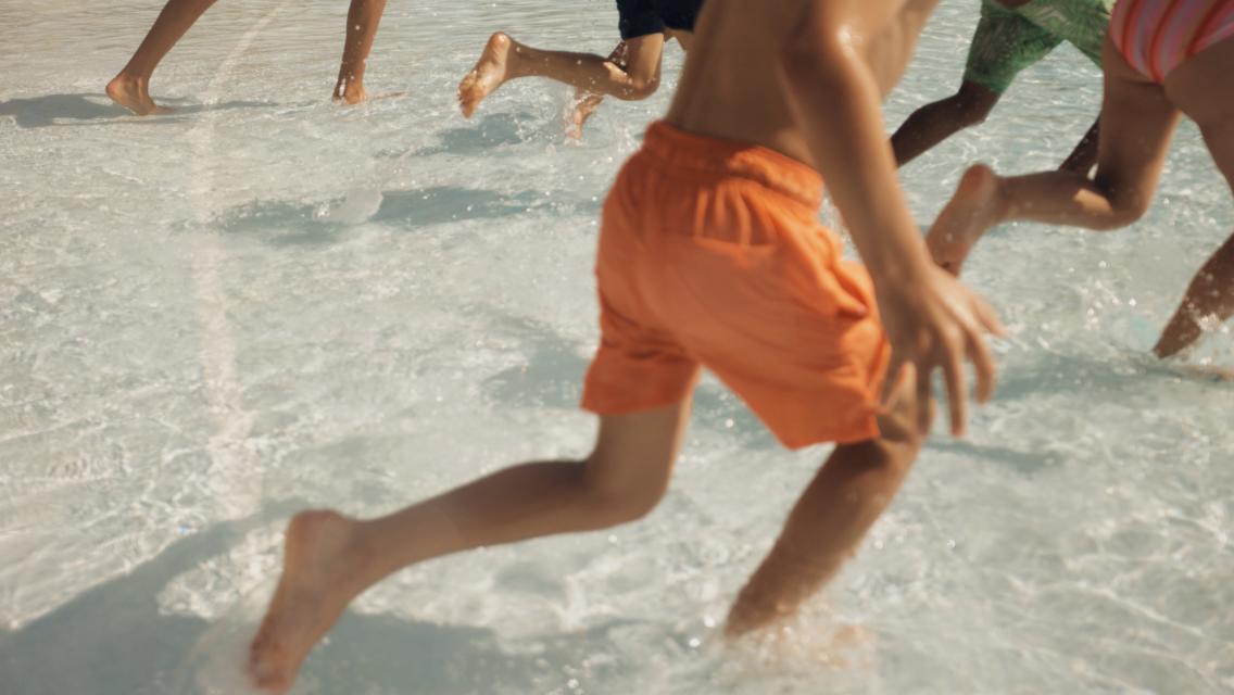 Kids running in water