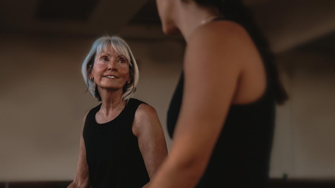 woman smiling in workout class