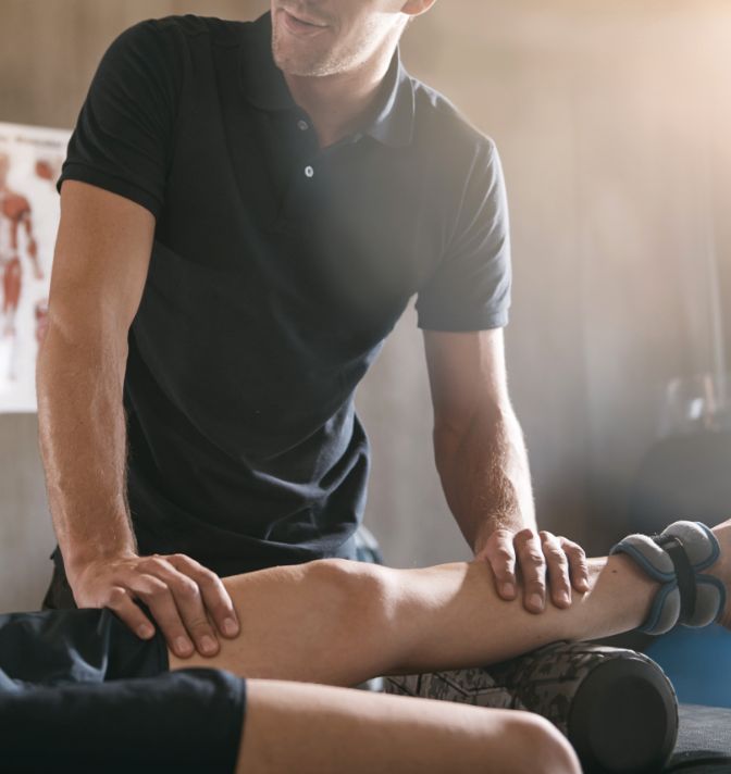 A Life Clinic chiropractor working on a patient.