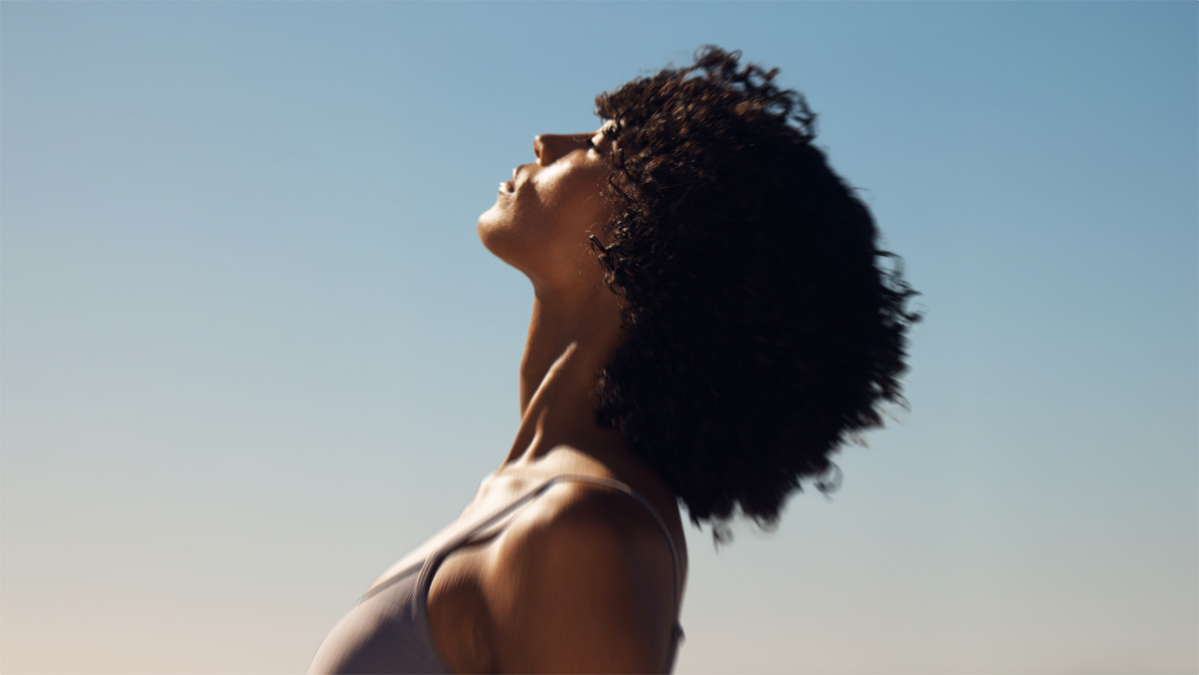 woman closing her eyes