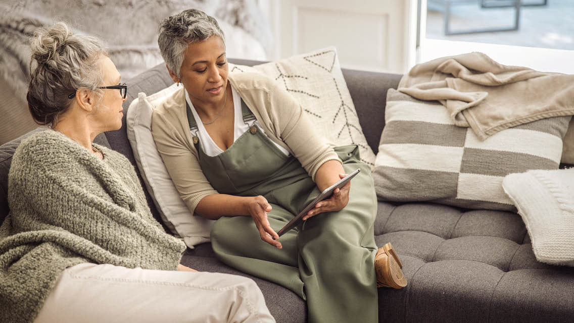 a woman shares something she read online with her friend