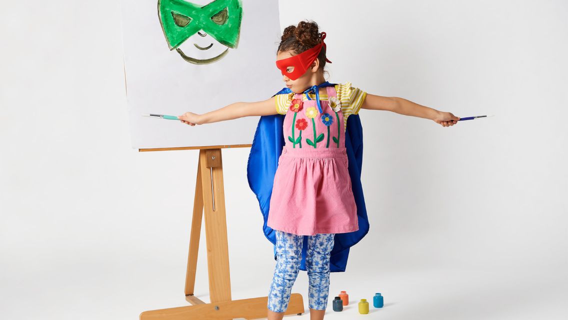 Kid dressed up as superhero