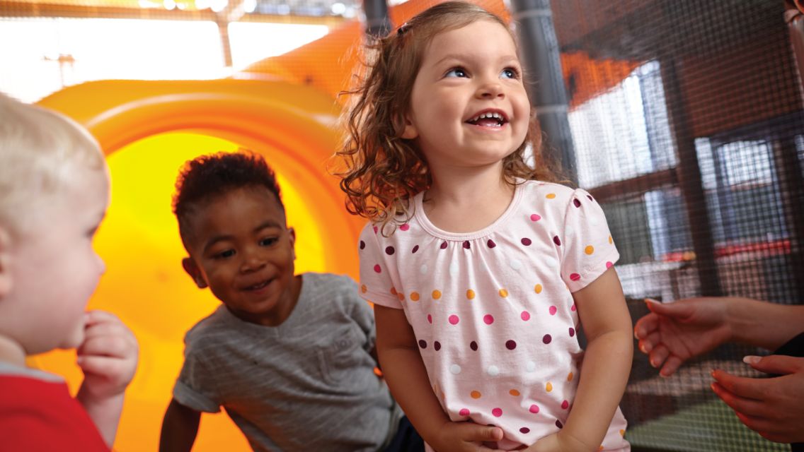 kids playing on a slide