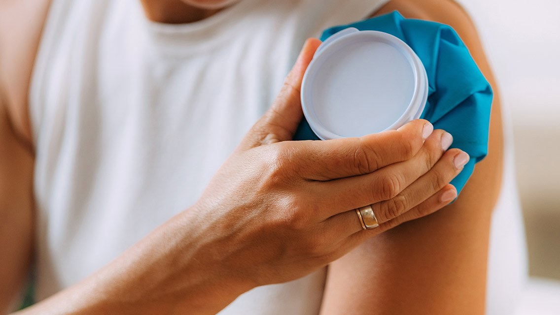 Person icing shoulder