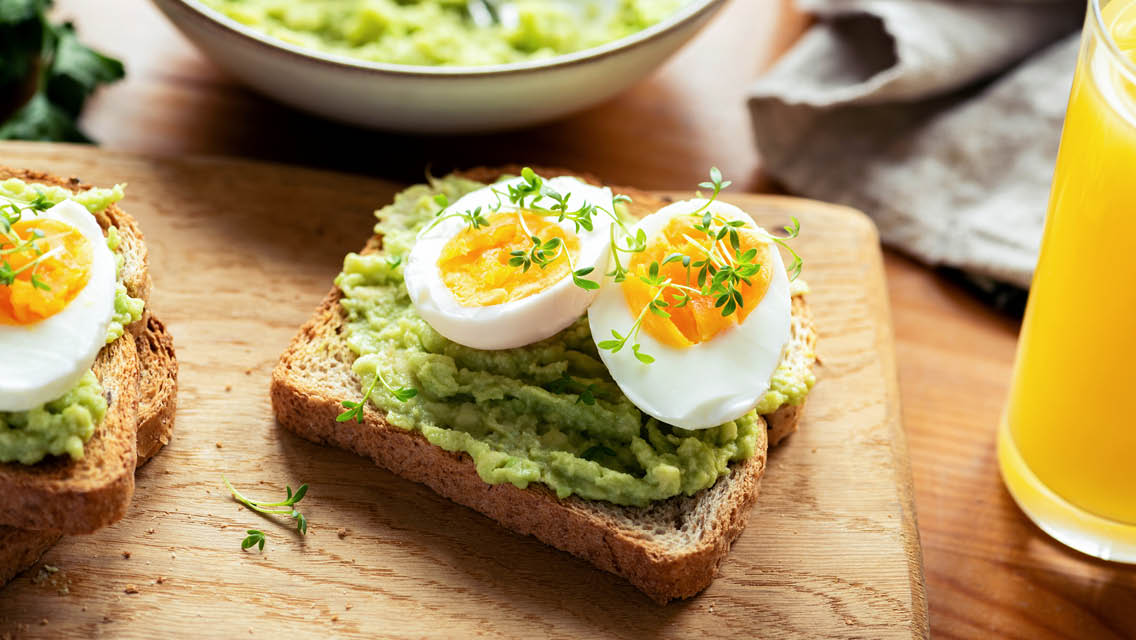 hard boiled eggs on avocado toast