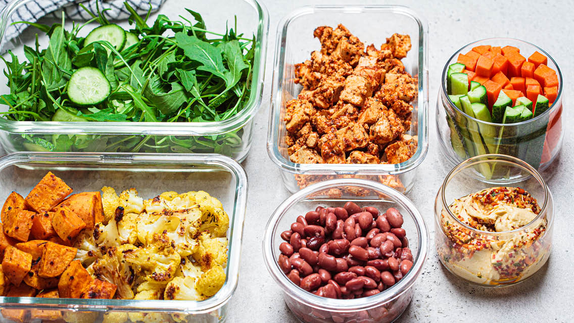 various staple foods in glass containers
