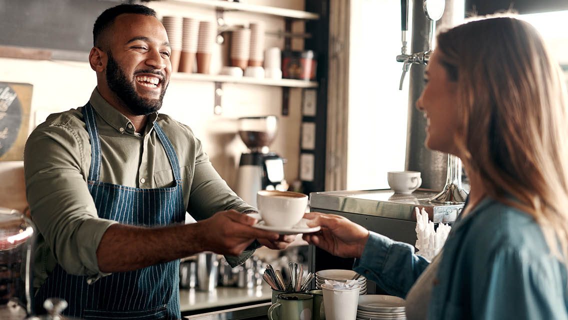 a customer engages with a barista