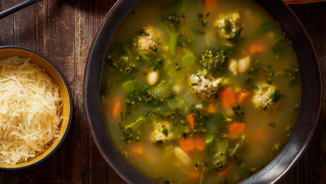 a bowl of soup with veggies