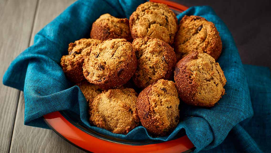 a basket of muffins to support postpartum recovery
