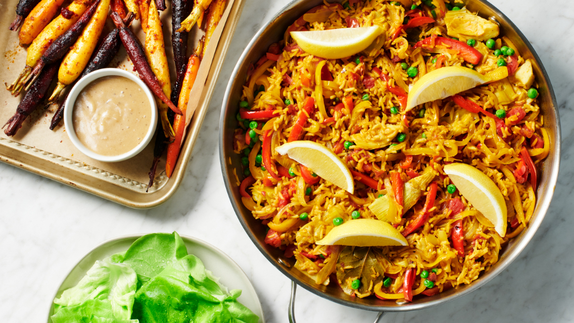 Spanish Vegan Paella With Harissa-Roasted Carrots and Maple Tahini