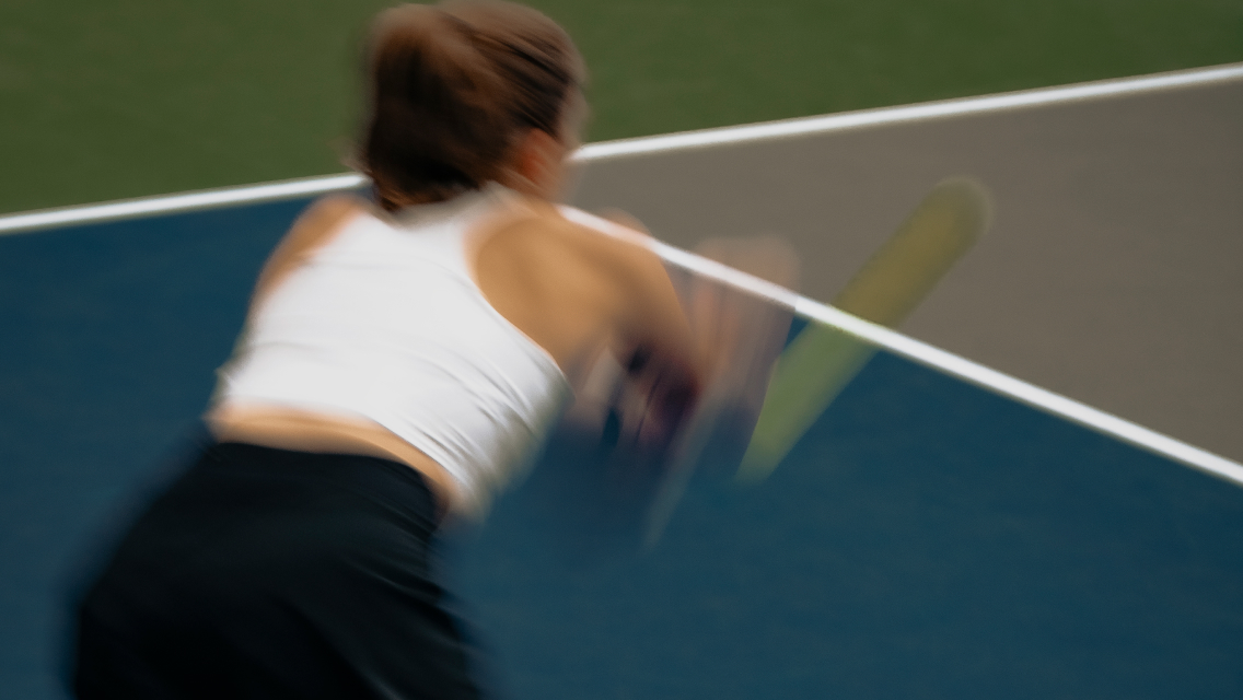 woman on pickleball court