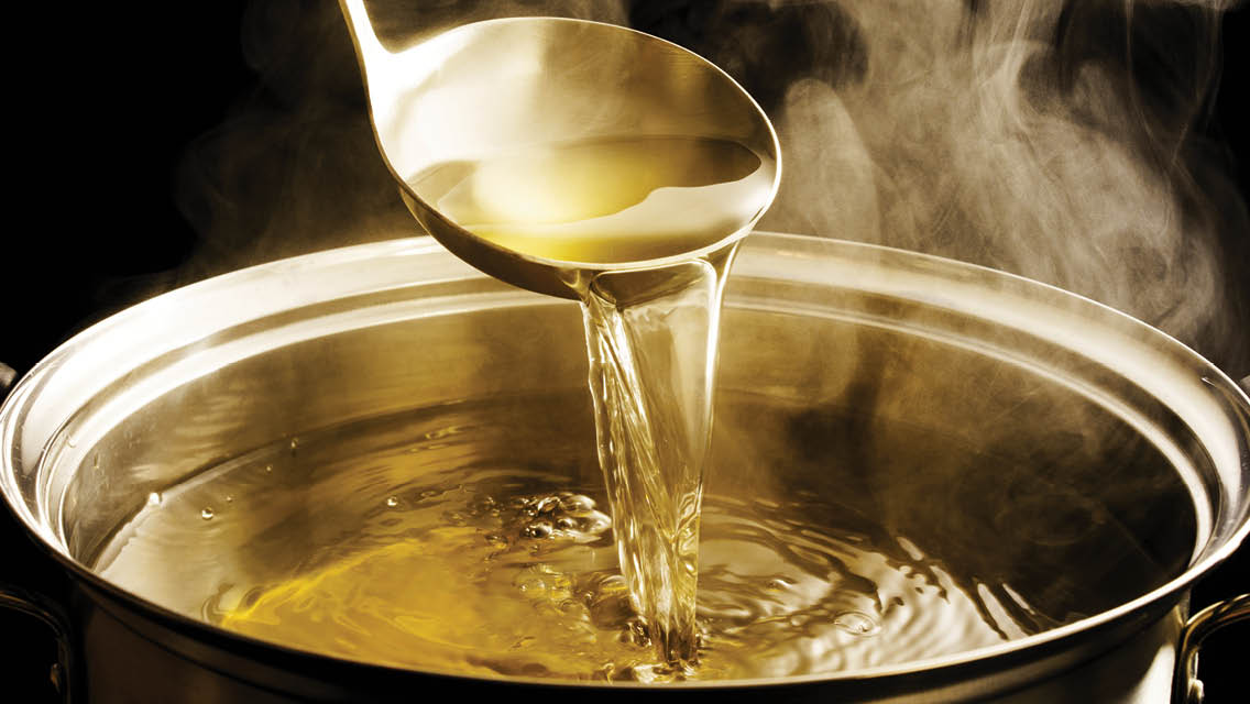 a golden, steaming broth