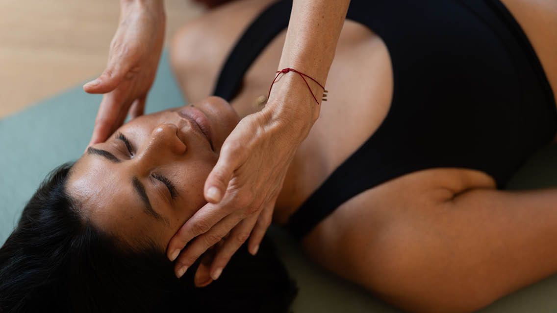 a person receiving reiki