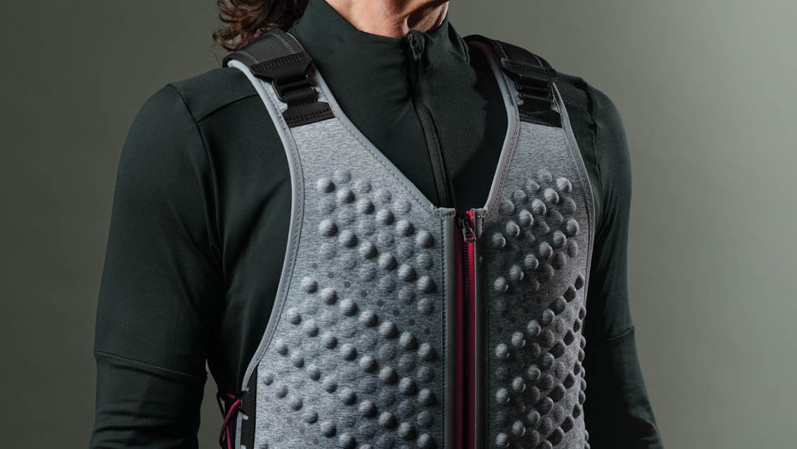 a woman wearing a weighted vest