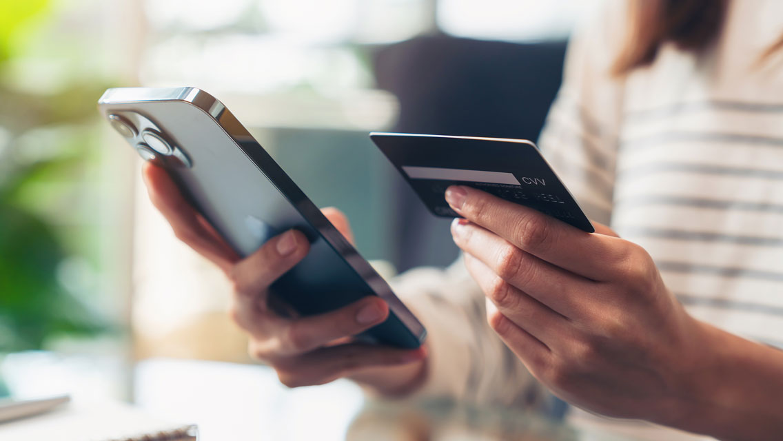 a person orders something online through their smartphone