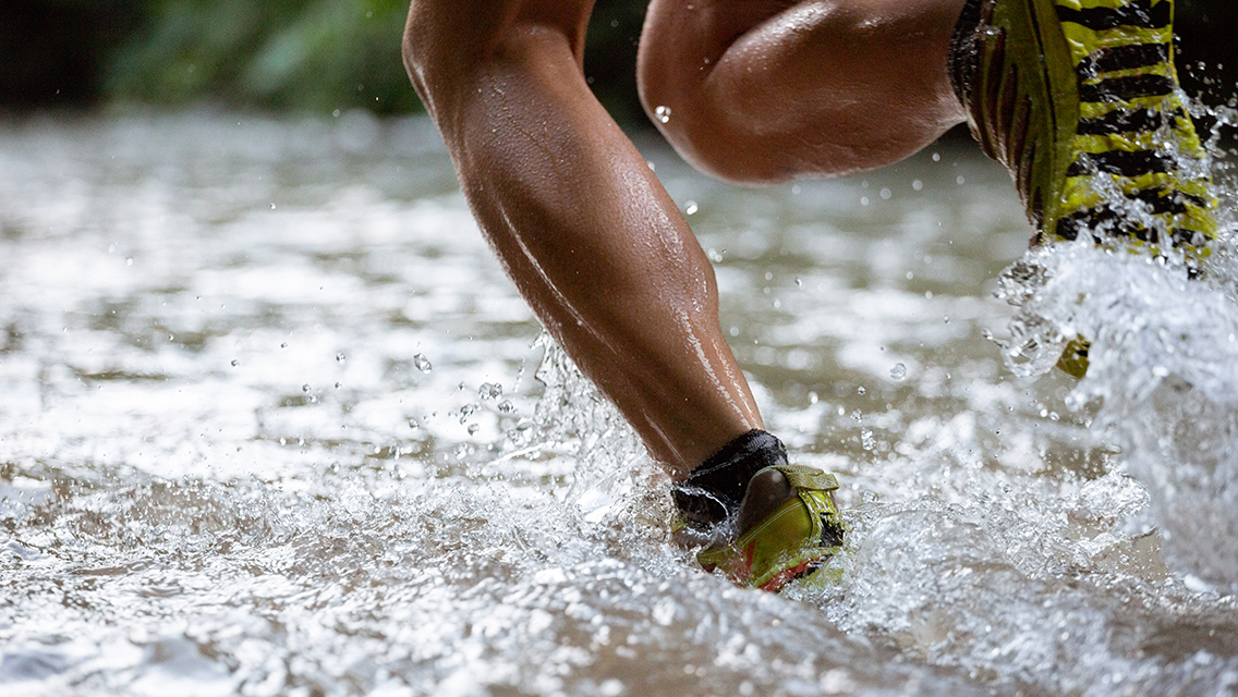 a person running through water