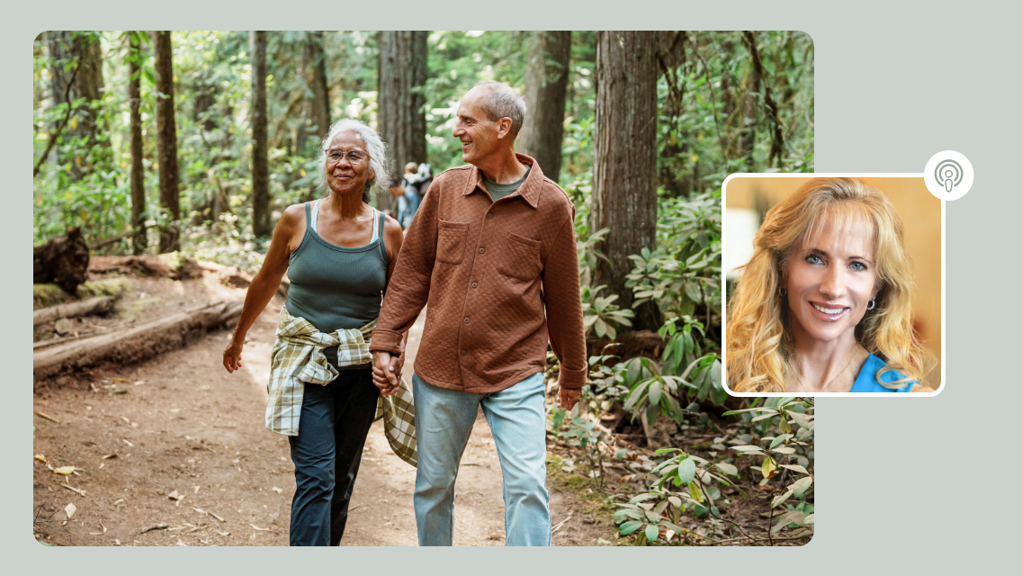 man and woman walking in the forest